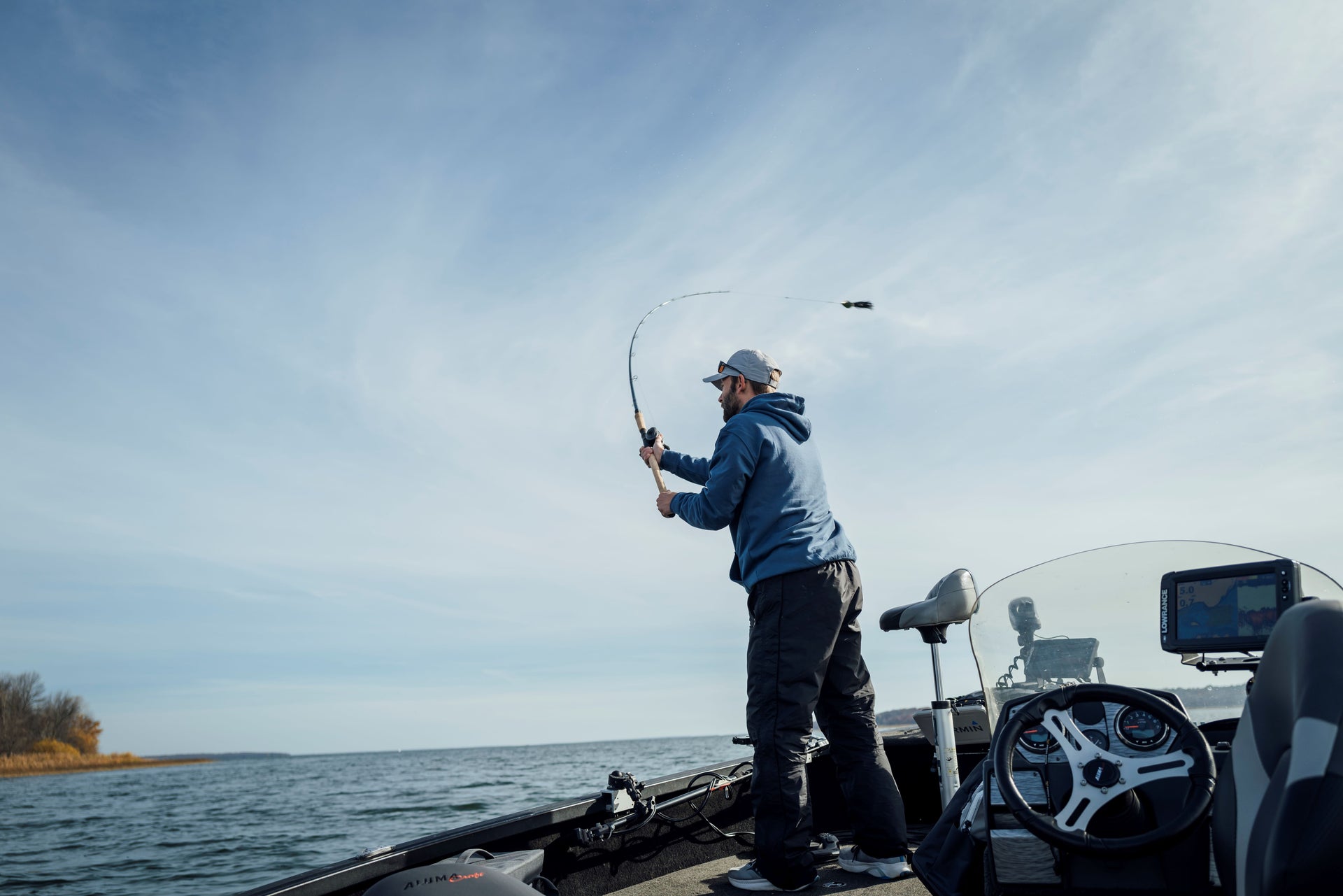Man fishing off a boat
