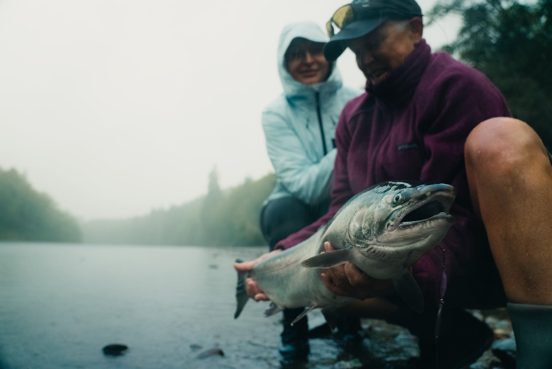 Woman holding a large fish