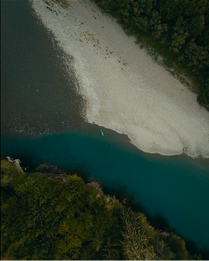 Zoomed out shot of boat in water from social media